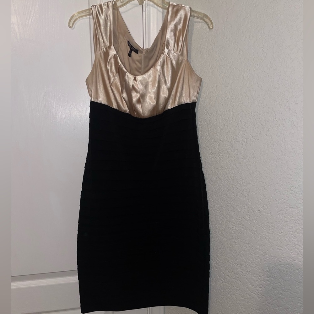 Black and tan cocktail dress with ruffles